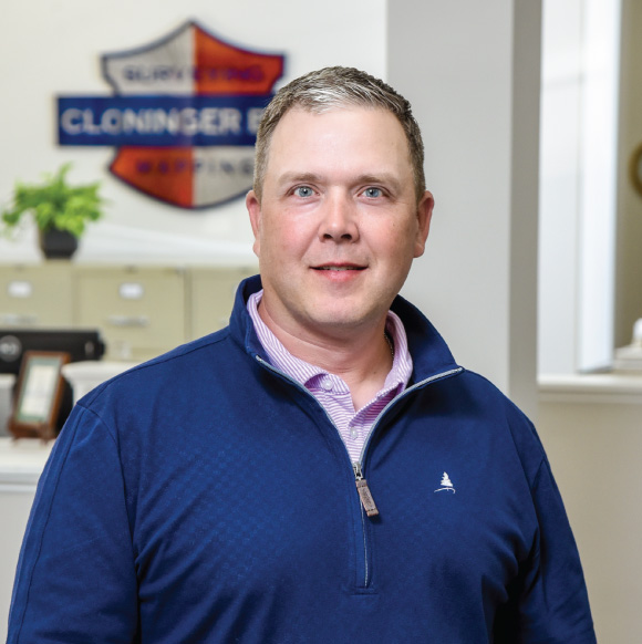 JUSTIN F. CLONINGER